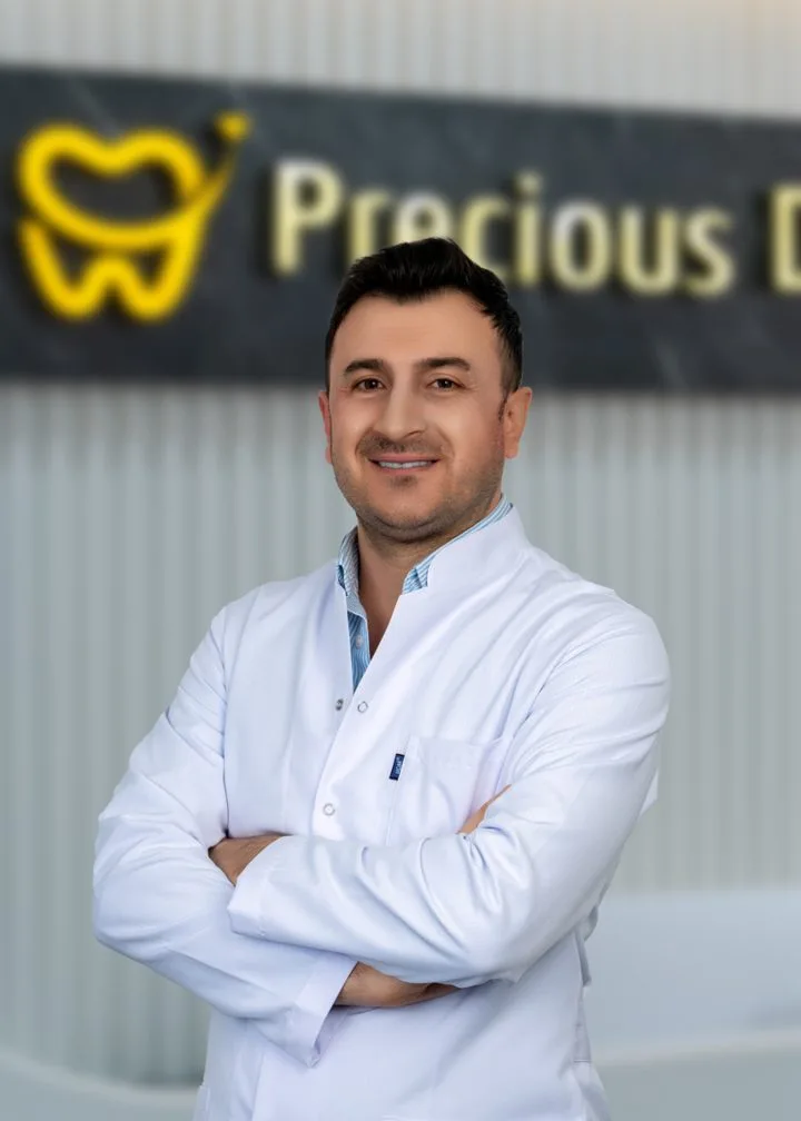 Dt. Hüseyin Yavuz Özbek, implant surgeon at Precious Dental